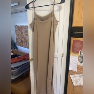 Simple, sleek, sexy tan dress you can dress up or dress down!